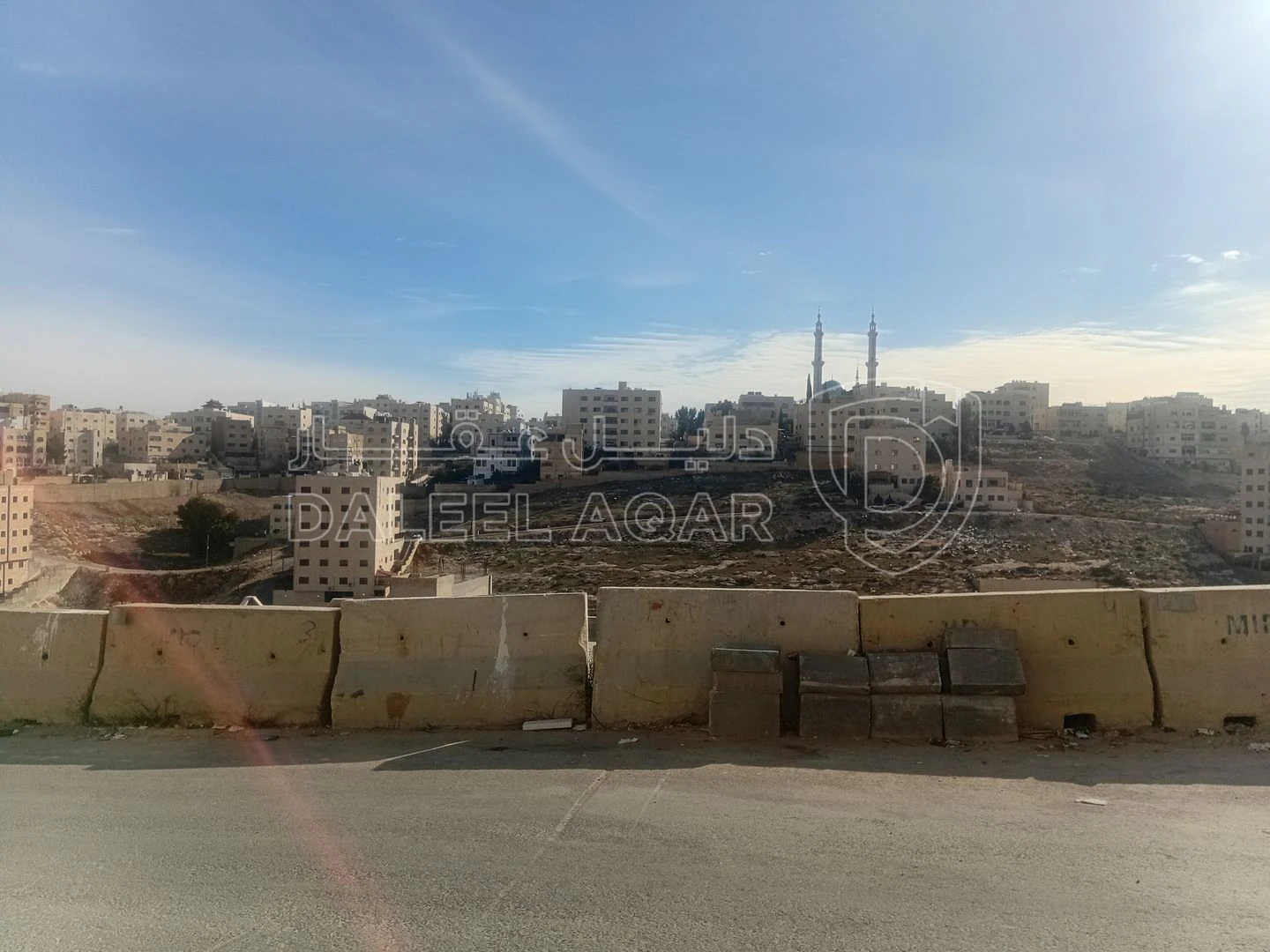 أرض في ابو علندا بين دوار كارفور ودوار البنزين  - 65,000 دأ - صورة 1