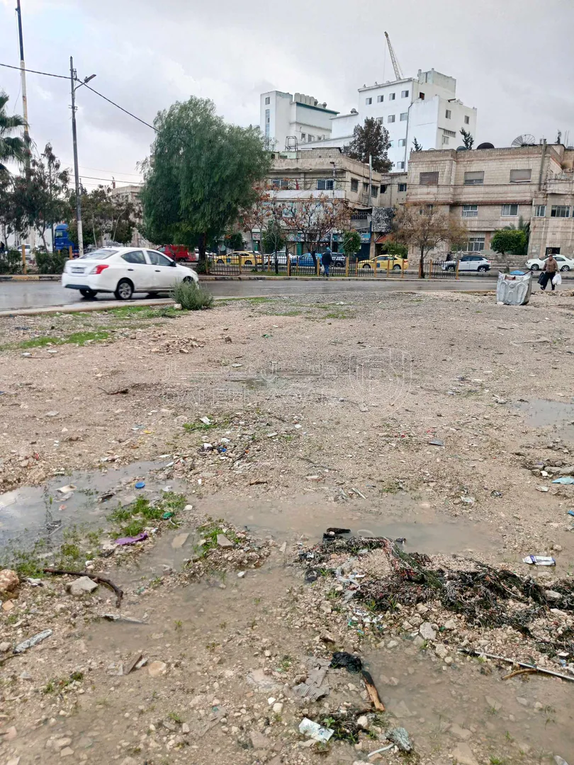 أرض في الزرقاء جسر الجبل الابيض - 130,000 دأ - صورة 1