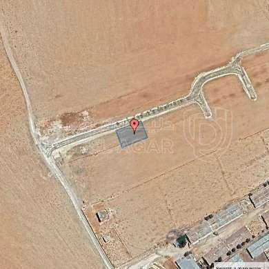 أرض في يبعد 600 متر عن شارع ال 100 - 24,000 دأ - صورة 1