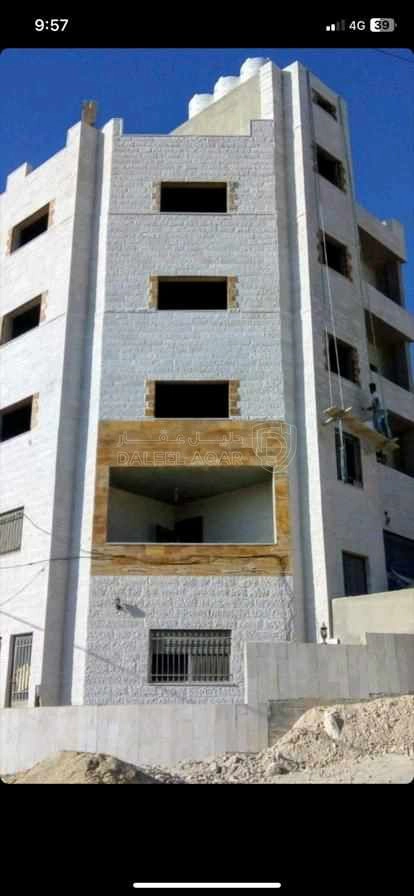 مبنى في الزرقاء ضاحية هيا شمال شرق مدارس و رياض الحكماء - 115,000 دأ - صورة 1