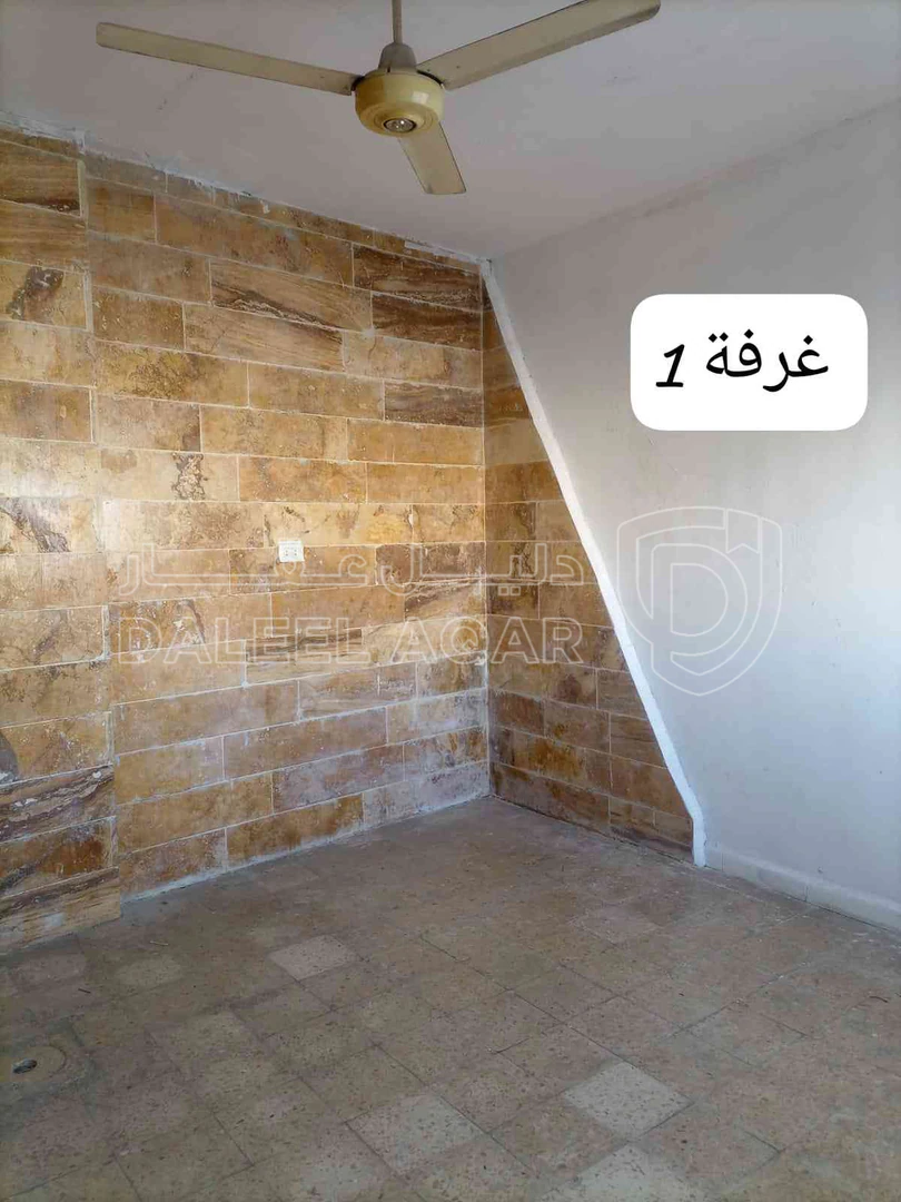 شقة في الرصيفة حي الحسين جانب مسجد التوحيد الجنوبي - 16,000 دأ - صورة 1