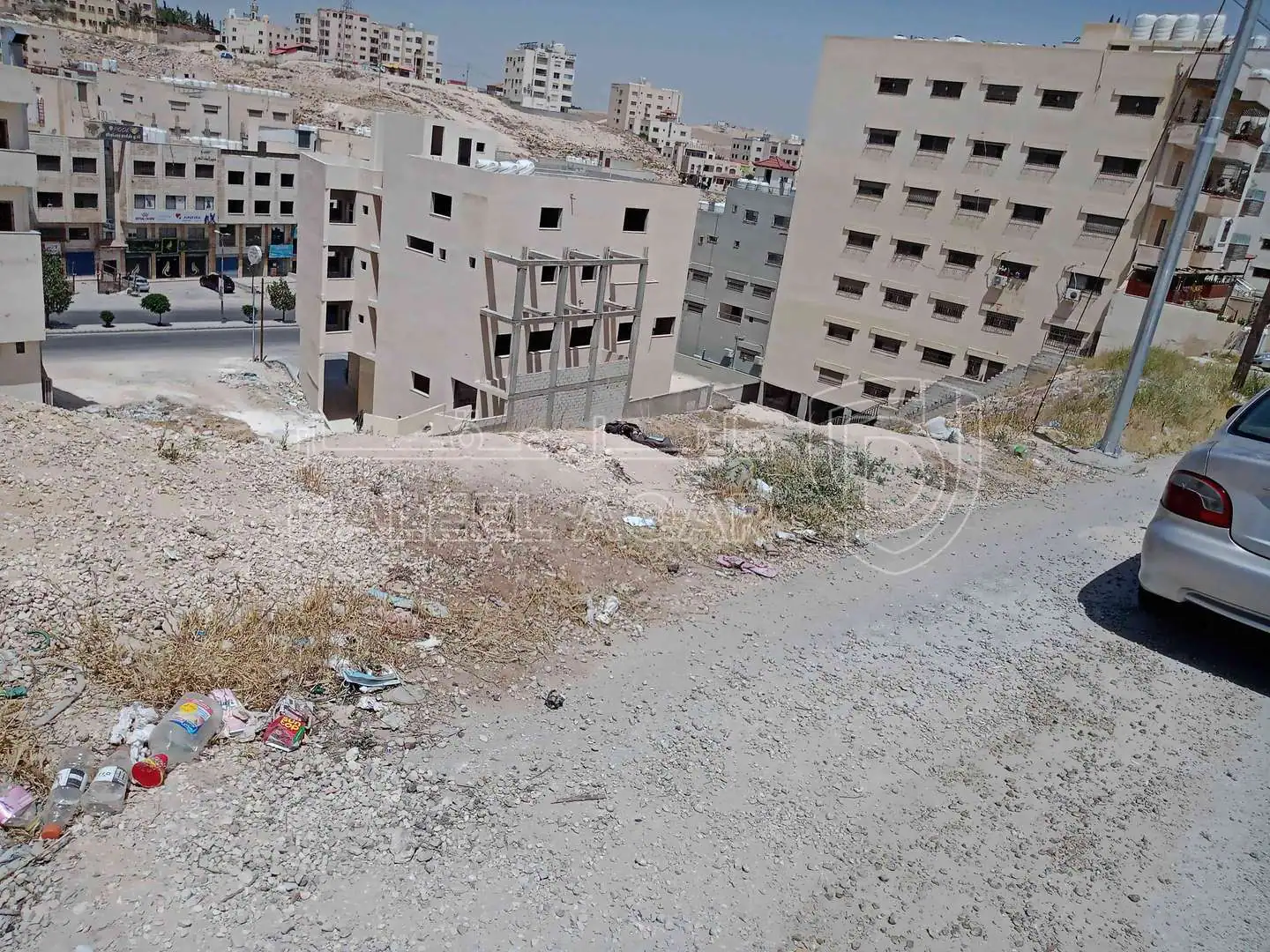 أرض في خلف محطة شحن السيارات الكهربائية شارع الكرامة - 59,000 دأ - صورة 1