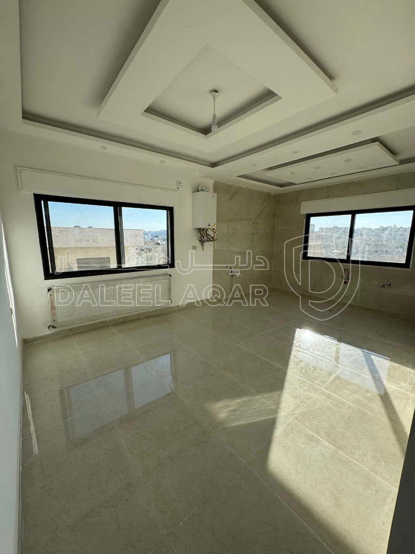 شقة في خلف الجامعة الاردنية  - 105,000 دأ - صورة 1