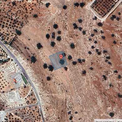 أرض في قرية البصة ضاحية السليحات - 120,000 دأ - صورة 1