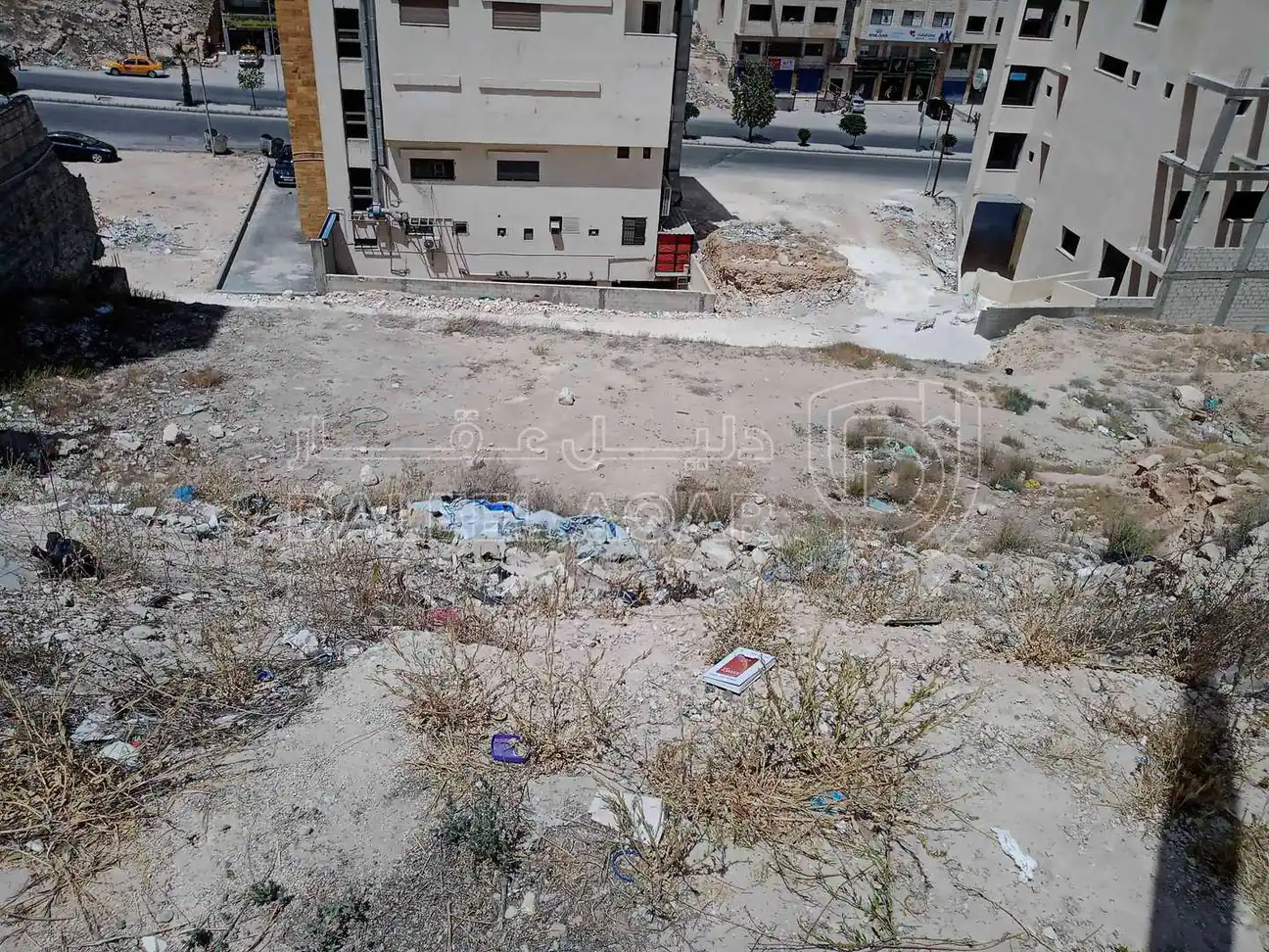 أرض في خلف محطة شحن السيارات الكهربائية شارع الكرامة - 59,000 دأ - صورة 1