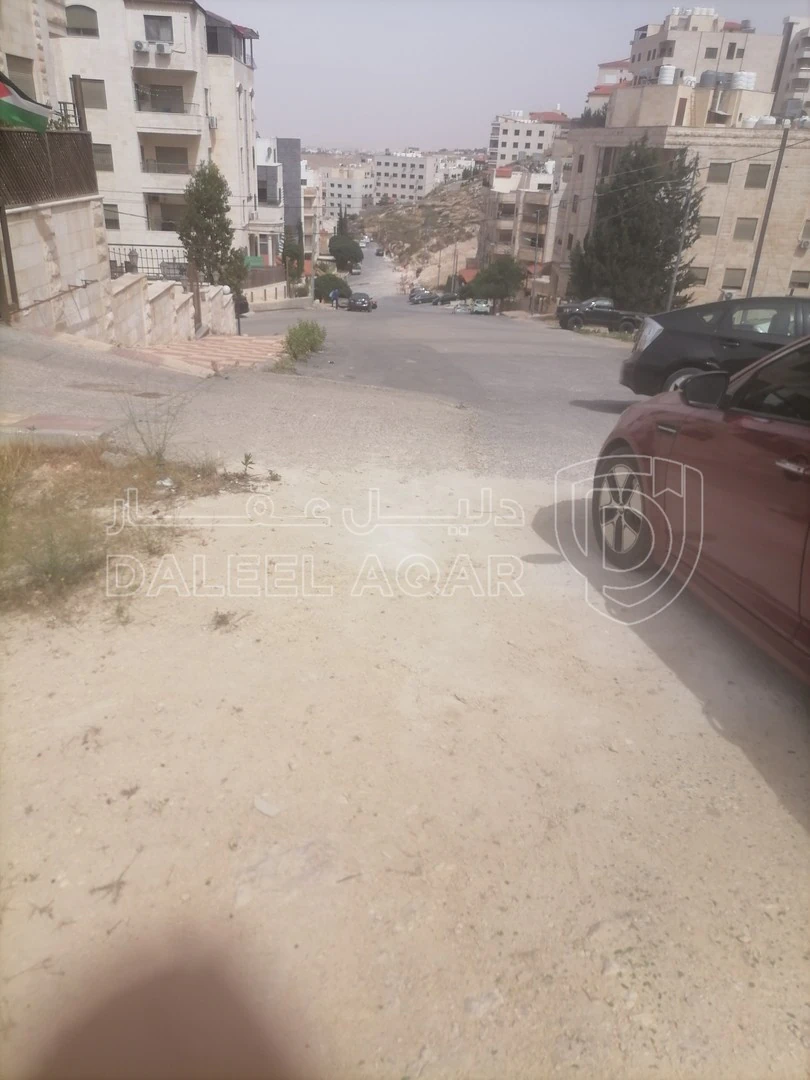 أرض في ضاحيه الرشيد قرب مسجد التقوى  - 150,000 دأ - صورة 1