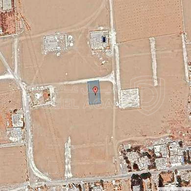 أرض في قبل جسر المطار ب 2 كم - 53,000 دأ - صورة 1