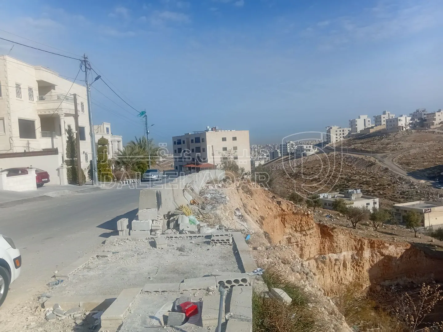 أرض في ابو علندا بين دوار كارفور ودوار البنزين  - 65,000 دأ - صورة 1