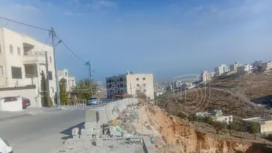 أرض في ابو علندا بين دوار كارفور ودوار البنزين  - 65,000 دأ - صورة NaN