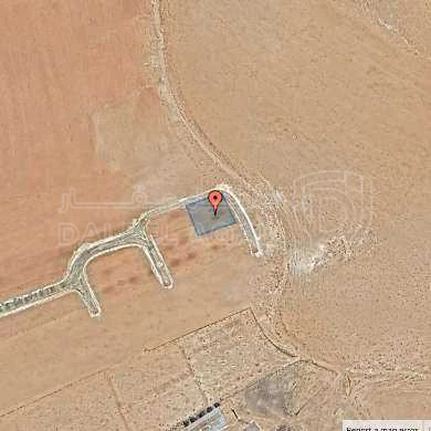 أرض في يبعد 600 متر عن شارع ال 100 - 24,000 دأ - صورة 1