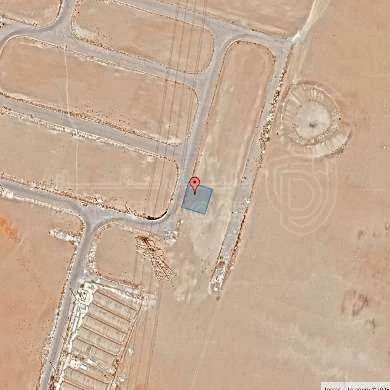 أرض في قرية الصلاحية - امتداد طريق المطار - 25,000 دأ - صورة 1