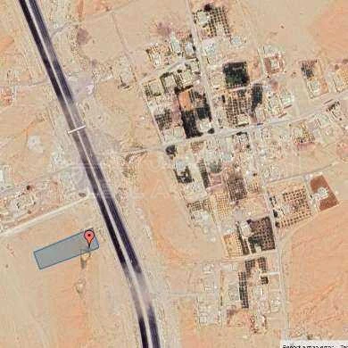 أرض في للبيع قطعة ارض على الطريقي الصحراوي مرخصه لكازية - 125,000 دأ - صورة 1