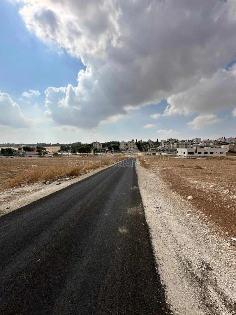 أرض في قطعة أرض مقابل كلية الدفاع-شارع مادبا الغربي - 75,000 دأ - صورة 1
