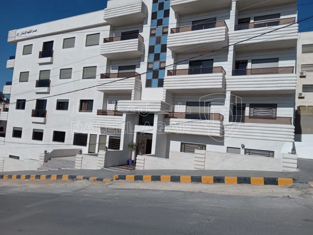 شقة في شقه ارضيه ١٤٥م طبربور خلف مسجد معاذ بن جبل  - 70,000 دأ - صورة 1