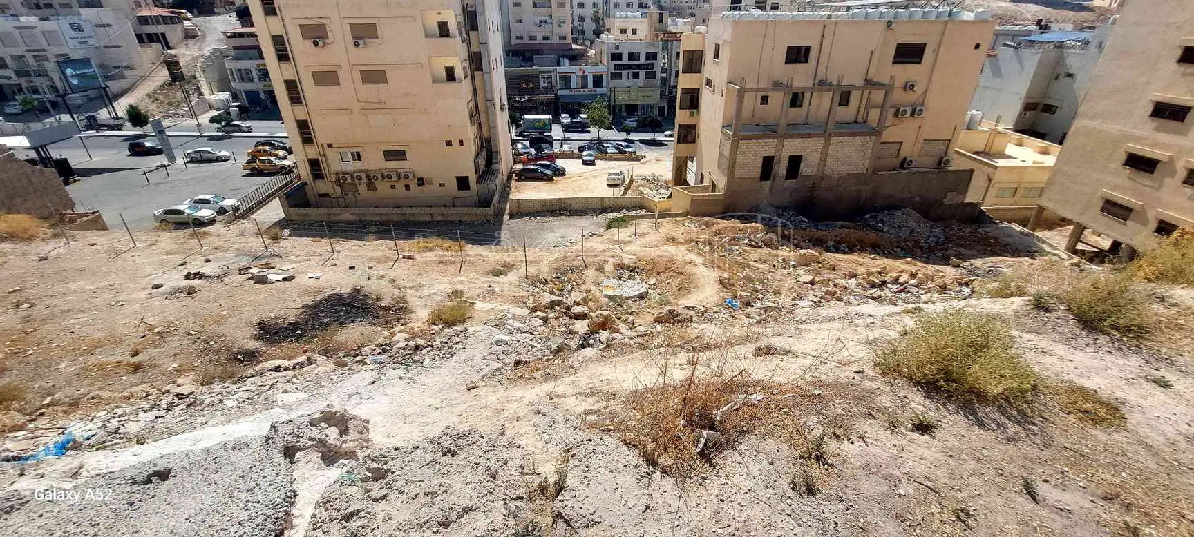 أرض في خلف محطة شحن السيارات الكهربائية شارع الكرامة - 59,000 دأ - صورة 1