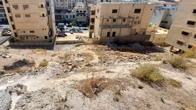 أرض في خلف محطة شحن السيارات الكهربائية شارع الكرامة - 60,000 دأ - صورة NaN