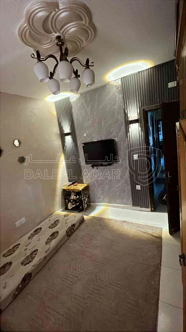 شقة في الزرقاء الجديده حي الإسكان  - 25,000 دأ - صورة 1
