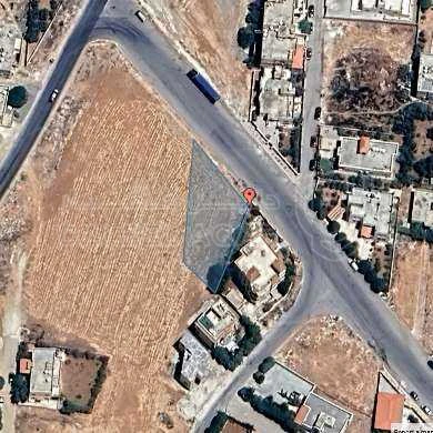 أرض في قطعة أرض في أجمل منطقة في سحاب حي ابو صوان  - 65,000 دأ - صورة 1