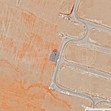 أرض في قرية الصلاحية - امتداد طريق المطار - 27,500 دأ - صورة 1