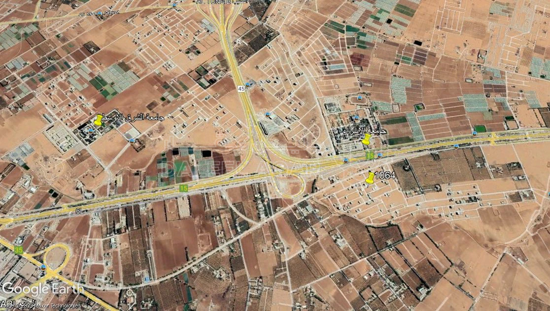 أرض في الطنيب مقابل الجامعه - 115,000 دأ - صورة 1