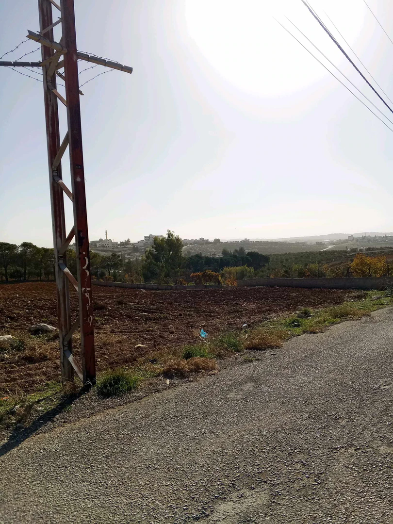 أرض في 1250م ناعور القهاقير ام القطين على شارعين - 175,000 دأ - صورة 1