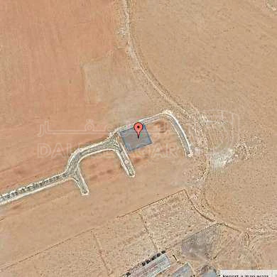 أرض في يبعد 600 متر عن شارع ال 100 - 24,000 دأ - صورة 1