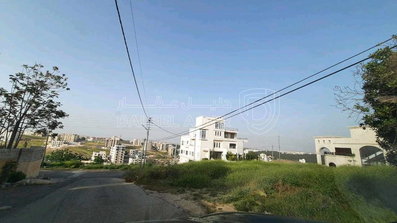 أرض في مرج الحمام طريق المطار خلف مدارس العالمية - 470,000 دأ - صورة 1