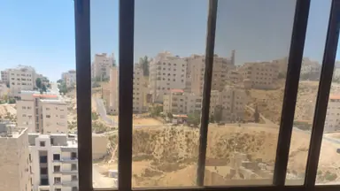 شقة في شقه في ضاحيه الرشيد 295م مع روف للبيع  - 100,000 دأ - صورة NaN