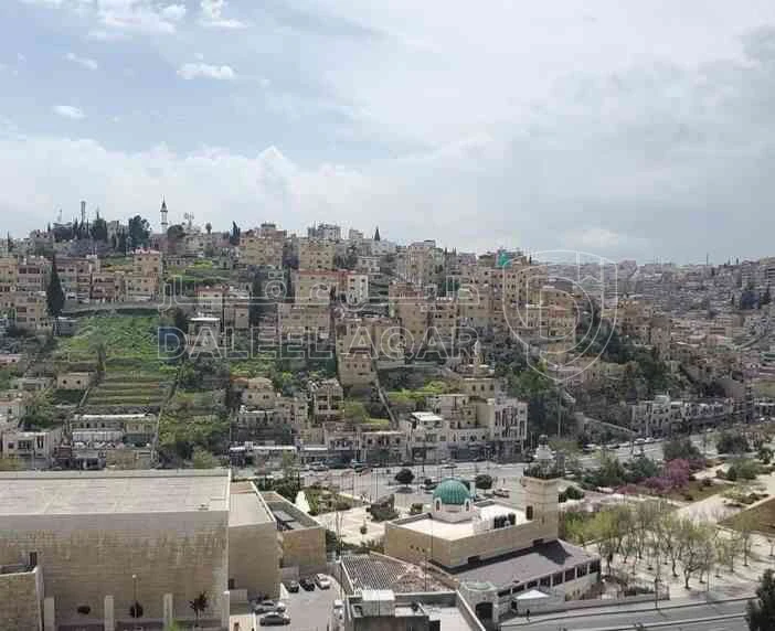 أرض في جبل عمان شارع خرفان مطلي على امانه عمان واسط البلد يوجد بها منسوب تحت الشارع واجهه الارض على الشارع 42 م تنظيم تجاري سكني ضمن سكن د - 150,000 دأ - صورة 1