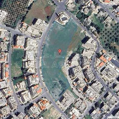 أرض في تلاع العلي، أرض للبيع، تقع على 3 شوارع - 6,844,750 دأ - صورة 1