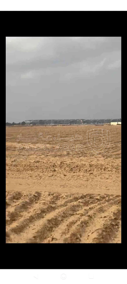 أرض في شارع المطار -خلف مطار الملكة علياء - 35,000 دأ - صورة 1