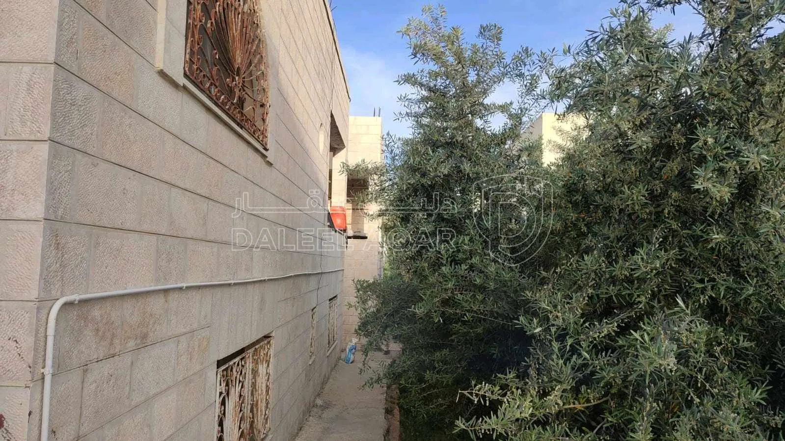 مبنى في سحاب خلف مدرسه  رفيده للبنات  - 100,000 دأ - صورة 1