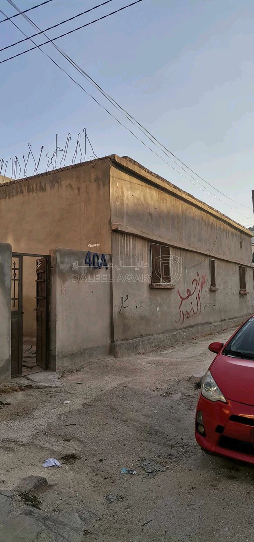 مبنى في الرمثا قرب مشفى الرمثا الحكومي  - 35,000 دأ - صورة 1