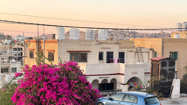 مبنى في الزرقاء -الزواهرة/الشارع الرئيسي 400م عن دوار خميس - 250,000 دأ - صورة NaN