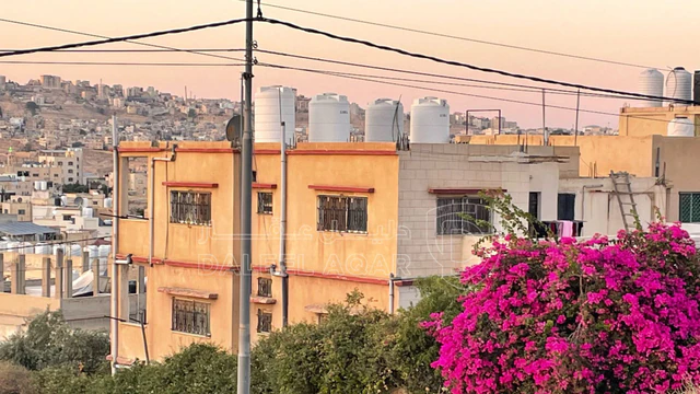 مبنى في الزرقاء -الزواهرة/الشارع الرئيسي 400م عن دوار خميس - 250,000 دأ - صورة NaN
