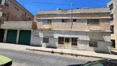 فيلا/منزل - اربد، شارع الطائي غرب مجمع الاغوار القديم - 45000 دأ