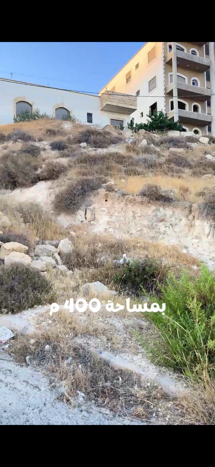أرض في ارض للبيع في صافوط تنظيم د بمساحة 400 م على اطلالة - 60,000 دأ - صورة 1