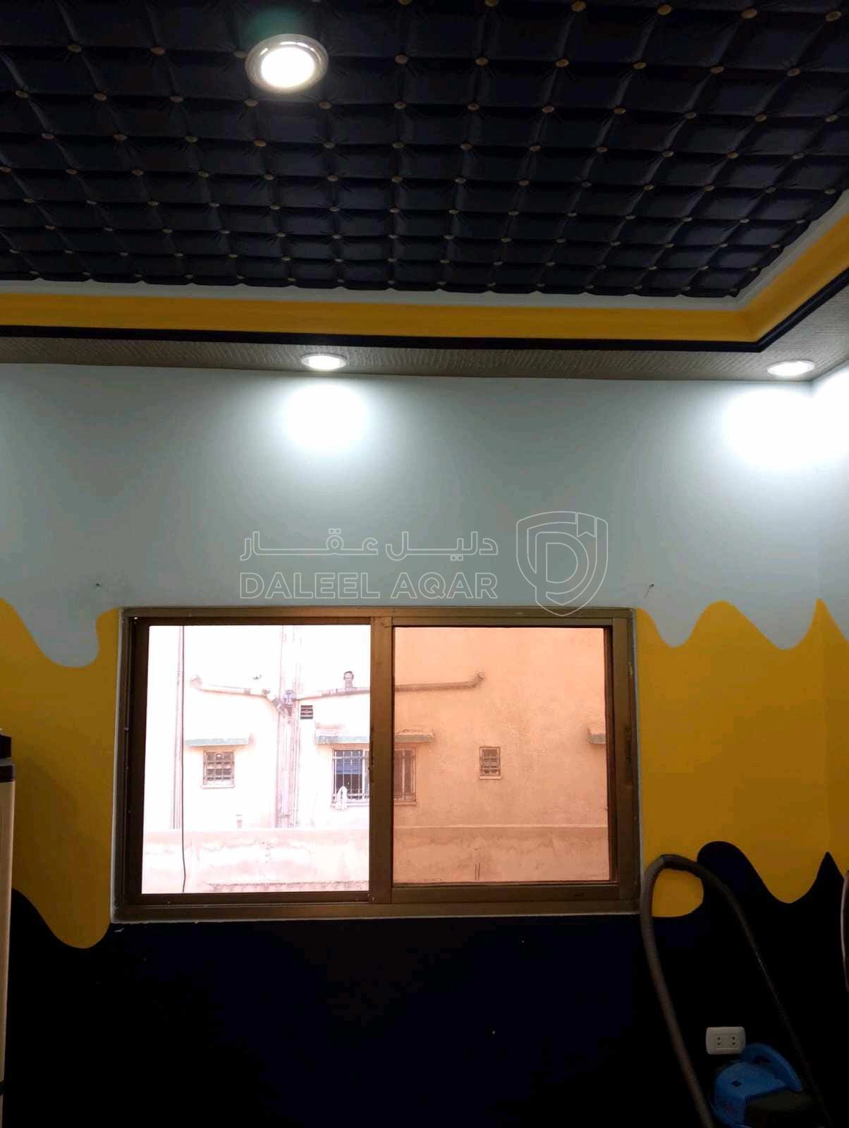 مبنى في عمارة للبيع منطقة ام نوارة  - 85,000 دأ - صورة 1