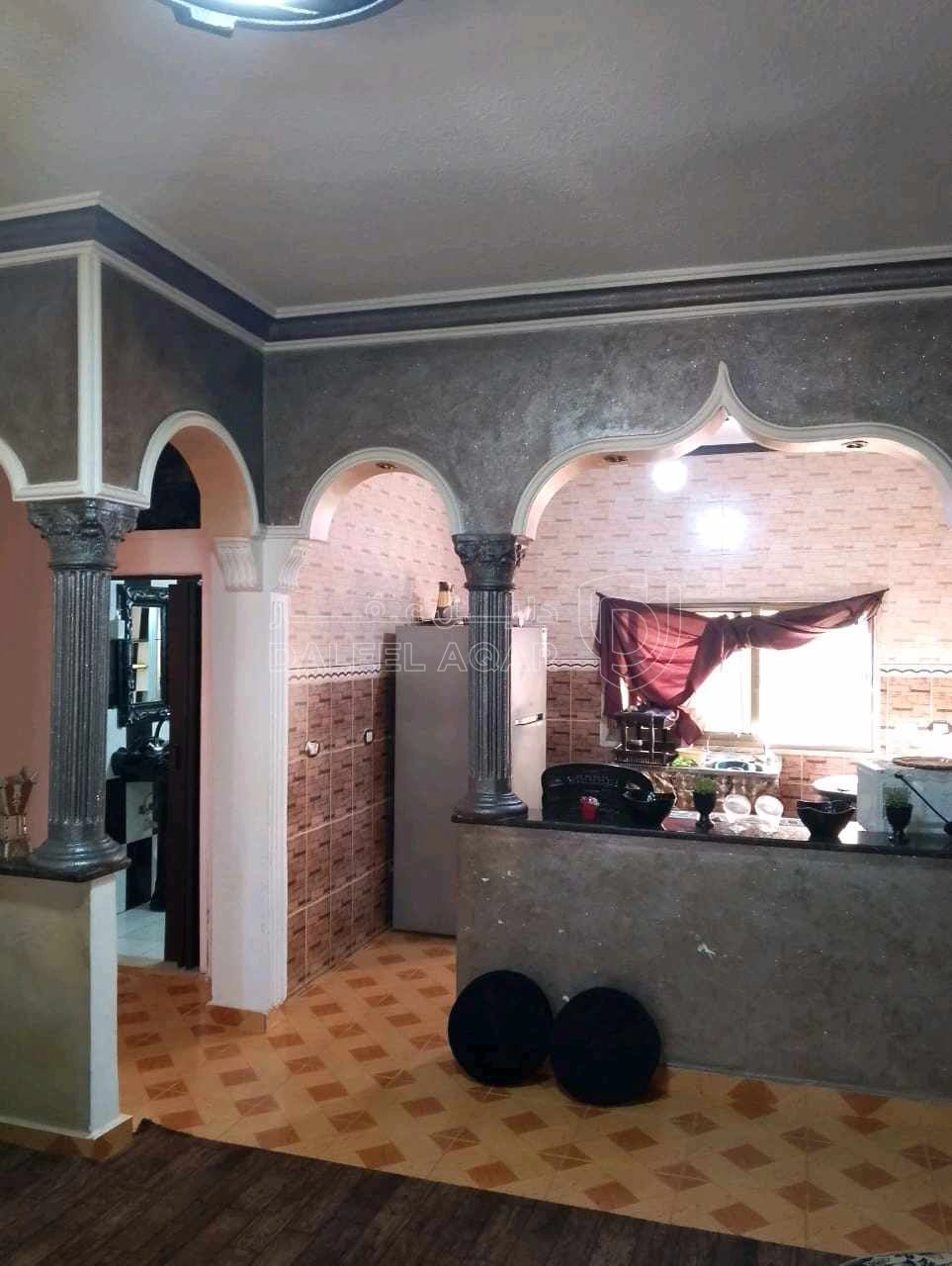 مبنى في عمارة للبيع منطقة ام نوارة  - 85,000 دأ - صورة 1