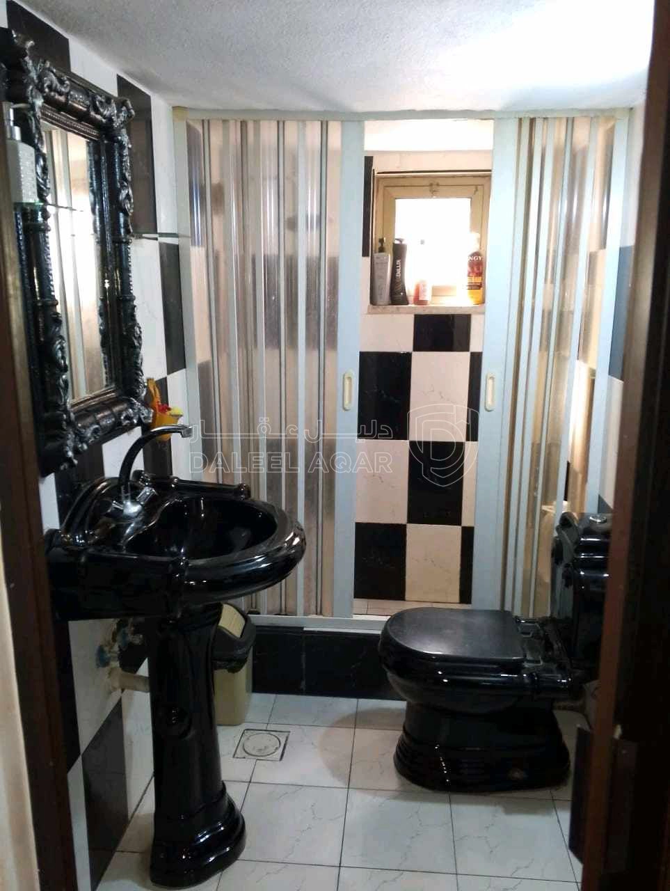 مبنى في عمارة للبيع منطقة ام نوارة  - 85,000 دأ - صورة 1