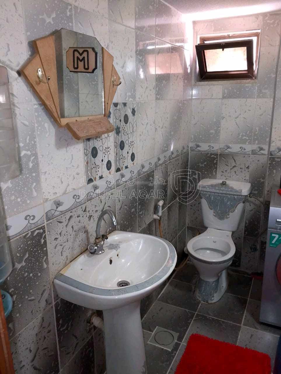 مبنى في عمارة للبيع منطقة ام نوارة  - 85,000 دأ - صورة 1