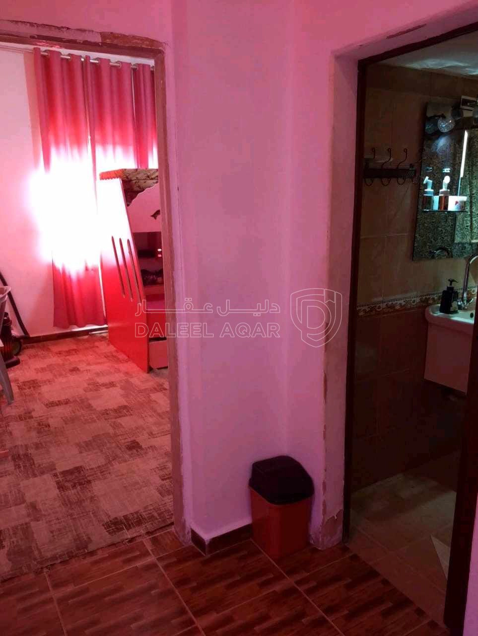 مبنى في عمارة للبيع منطقة ام نوارة  - 85,000 دأ - صورة 1