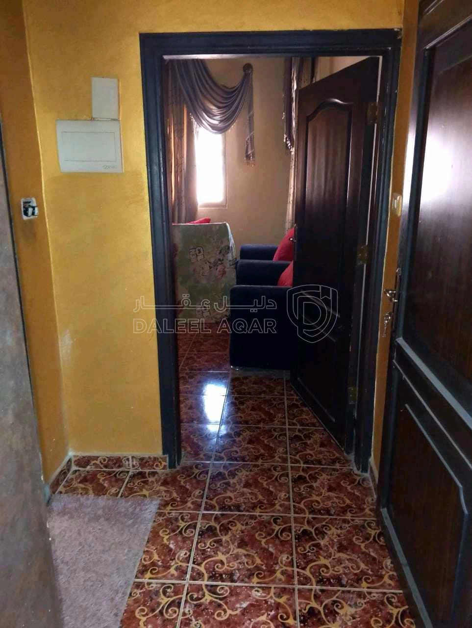 مبنى في عمارة للبيع منطقة ام نوارة  - 85,000 دأ - صورة 1