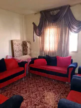 مبنى في عمارة للبيع منطقة ام نوارة  - 85,000 دأ - صورة NaN