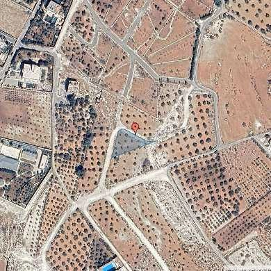 أرض في ناعور/ أم القطين - قرب مسجد الفاروق - 80,000 دأ - صورة 1
