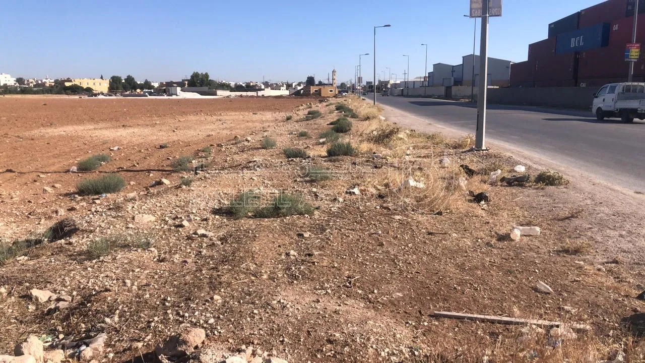 أرض في رجم الشامي بالقرب من شارع ال100 - 89,500 دأ - صورة 1