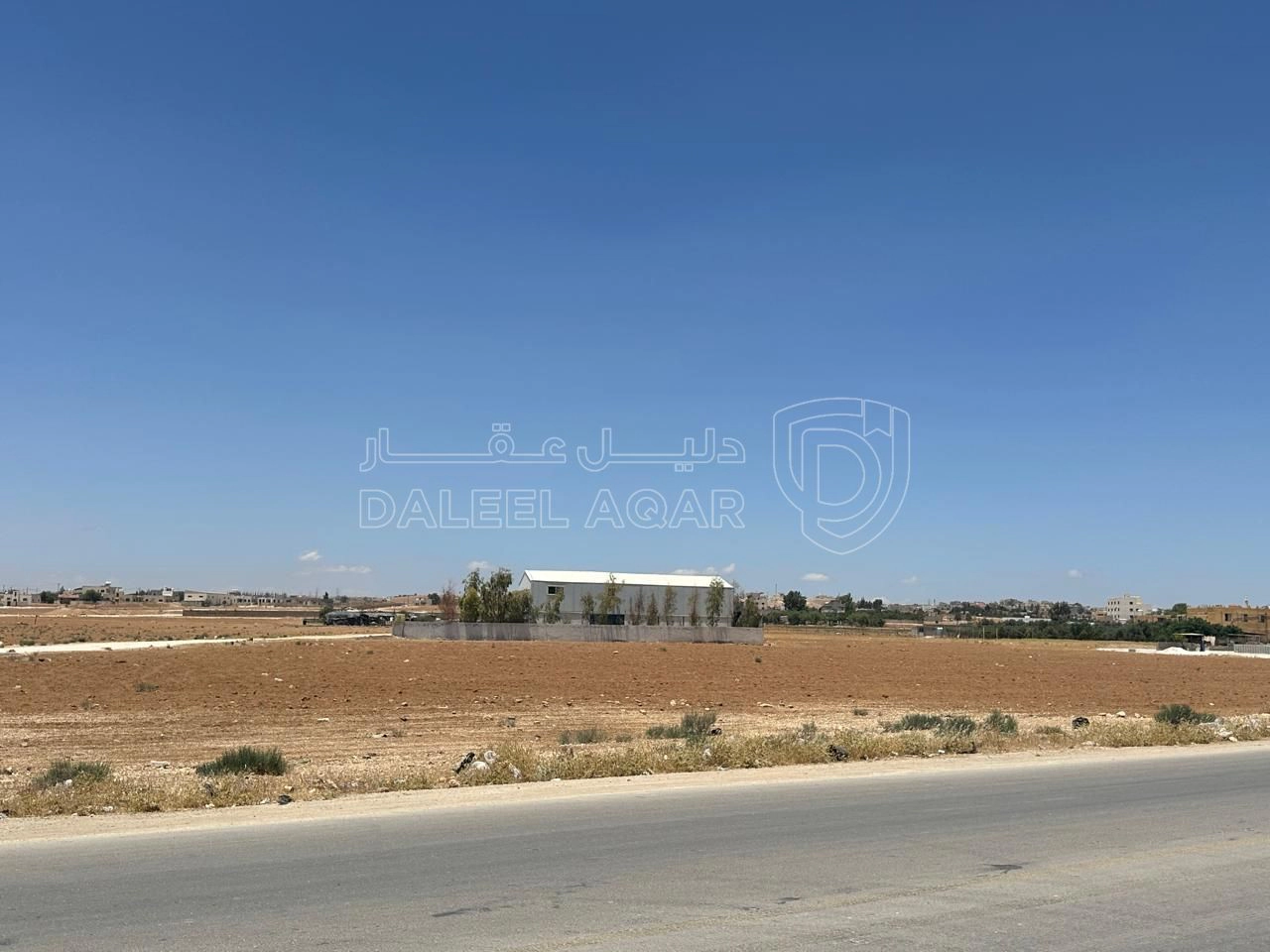 أرض في رجم الشامي بالقرب من شارع ال100 - 89,500 دأ - صورة 1