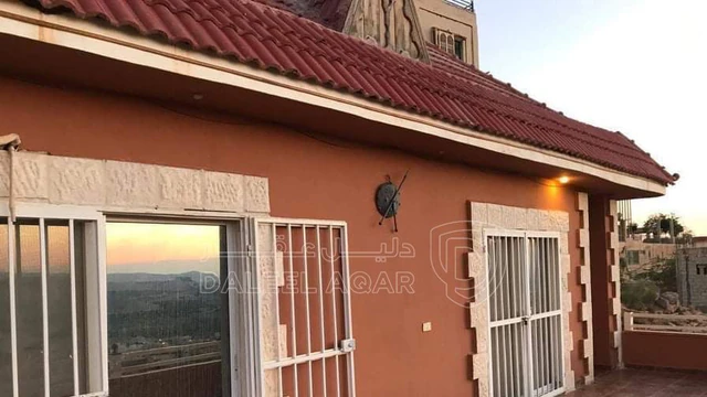 مزرعة/شاليه في بعد نقطة الجيش ٣٠٠ متر باتجاه الكفرين على الشمال  - 120,000 دأ - صورة NaN