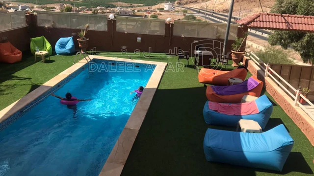 مزرعة/شاليه في بعد نقطة الجيش ٣٠٠ متر باتجاه الكفرين على الشمال  - 120,000 دأ - صورة NaN