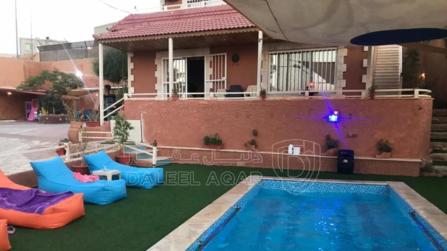 مزرعة/شاليه في بعد نقطة الجيش ٣٠٠ متر باتجاه الكفرين على الشمال  - 120,000 دأ - صورة NaN